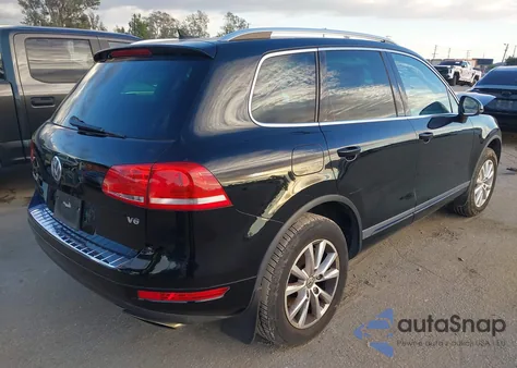 2014 Volkswagen Touareg 3.6L Sport z USA, uszkodzony, nr VIN WVGEF9BP2ED002282